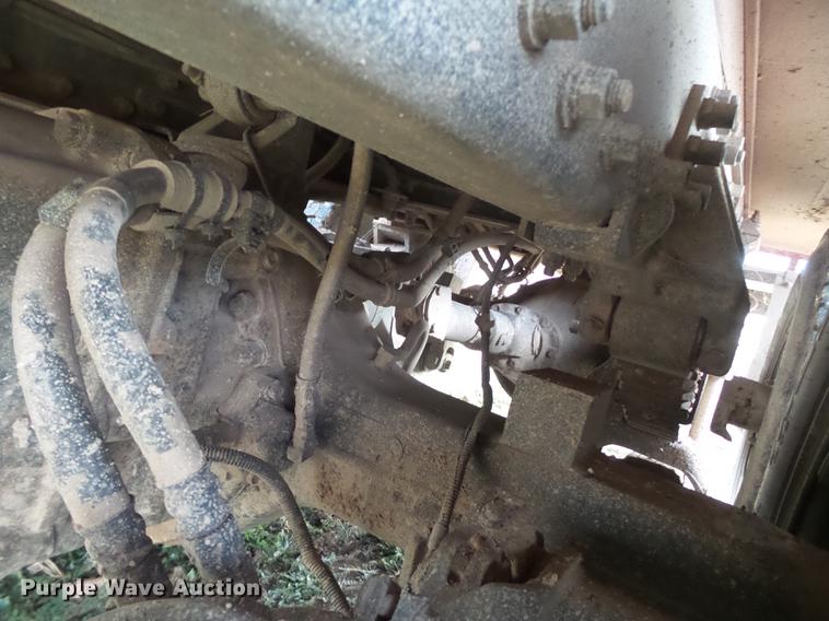 image for item EI9723 2002 Peterbilt 330 flatbed water truck