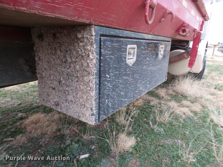 image for item EI9723 2002 Peterbilt 330 flatbed water truck