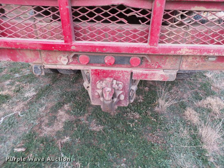 image for item EI9723 2002 Peterbilt 330 flatbed water truck