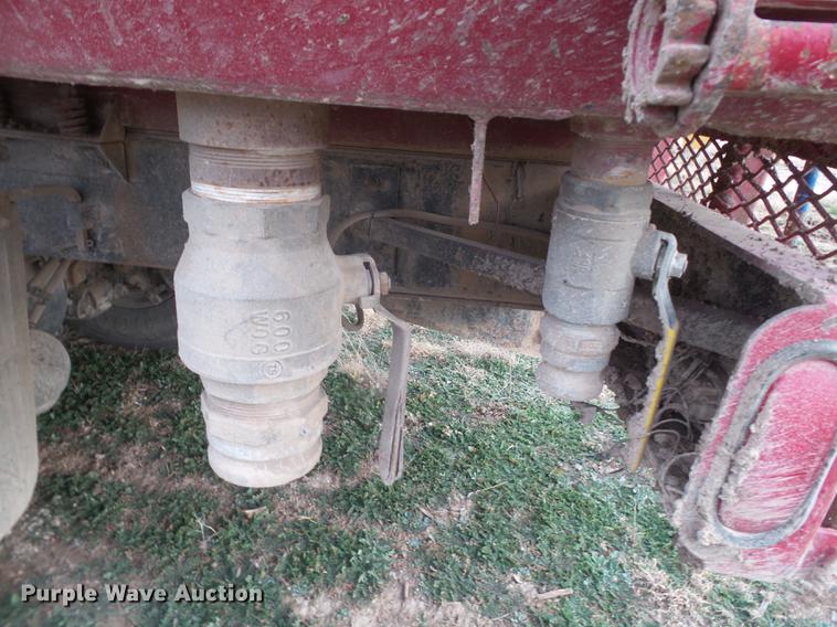 image for item EI9723 2002 Peterbilt 330 flatbed water truck