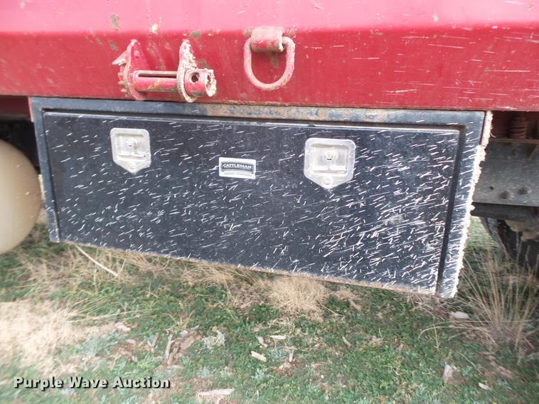 image for item EI9723 2002 Peterbilt 330 flatbed water truck