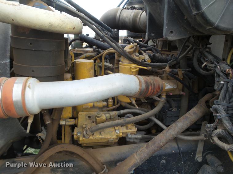 image for item EI9723 2002 Peterbilt 330 flatbed water truck