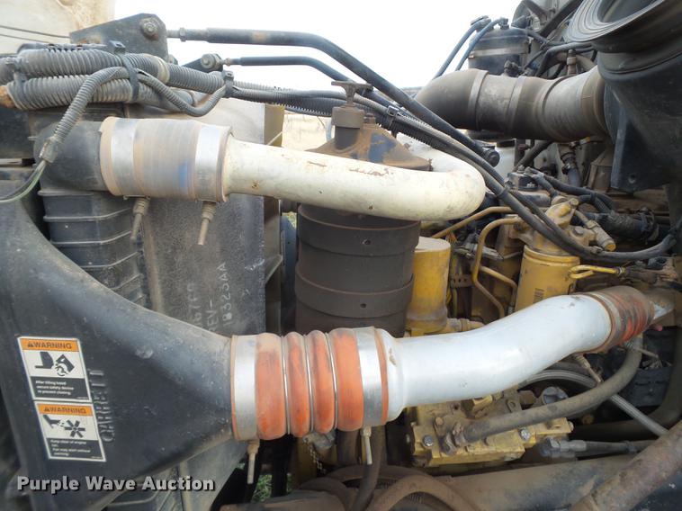 image for item EI9723 2002 Peterbilt 330 flatbed water truck