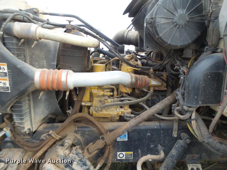 image for item EI9723 2002 Peterbilt 330 flatbed water truck