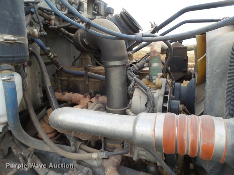 image for item EI9723 2002 Peterbilt 330 flatbed water truck