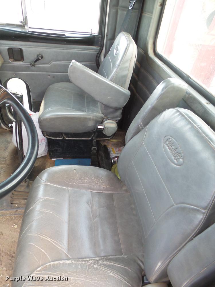 image for item EI9723 2002 Peterbilt 330 flatbed water truck