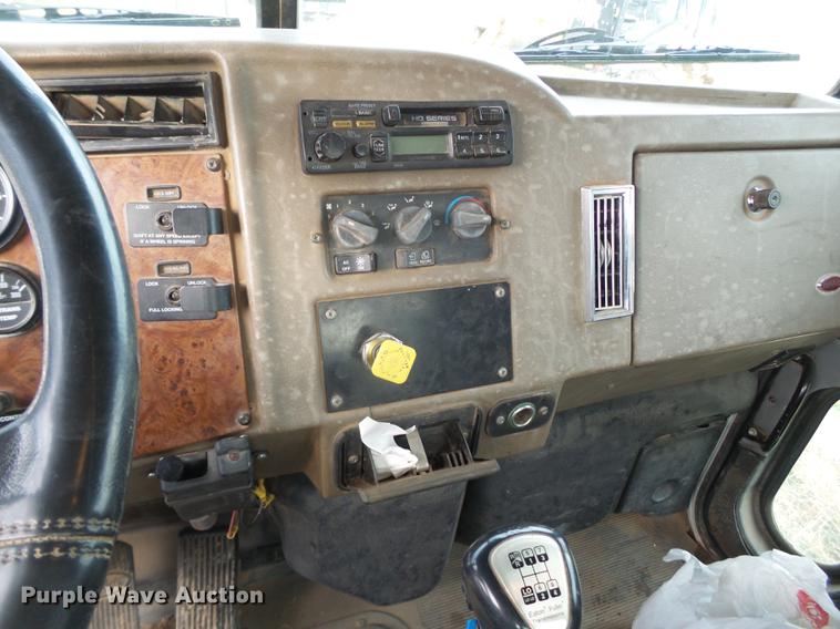 image for item EI9723 2002 Peterbilt 330 flatbed water truck