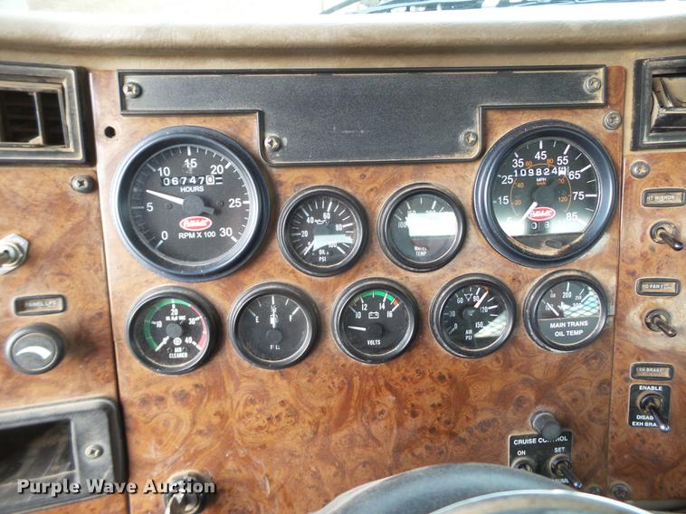 image for item EI9723 2002 Peterbilt 330 flatbed water truck