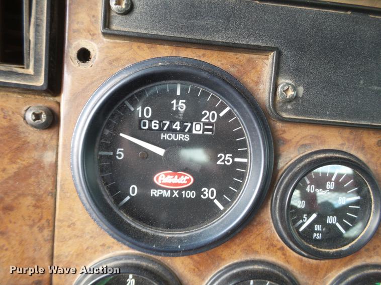 image for item EI9723 2002 Peterbilt 330 flatbed water truck