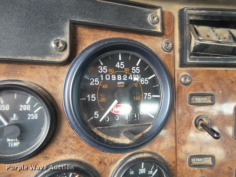 image for item EI9723 2002 Peterbilt 330 flatbed water truck