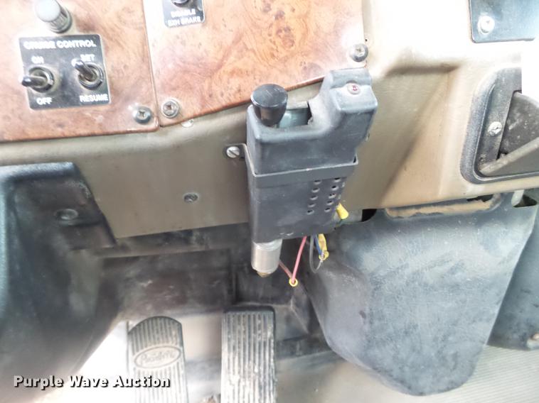 image for item EI9723 2002 Peterbilt 330 flatbed water truck