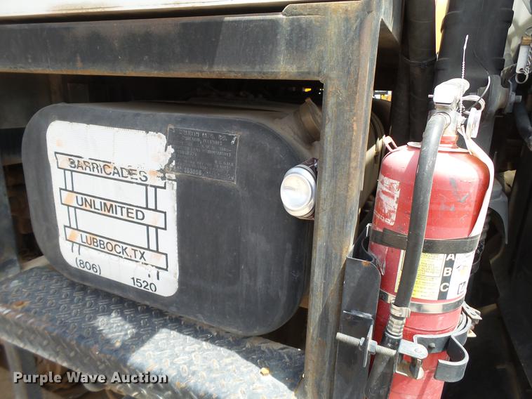 image for item EN9620 1999 GMC T6500 road striper truck