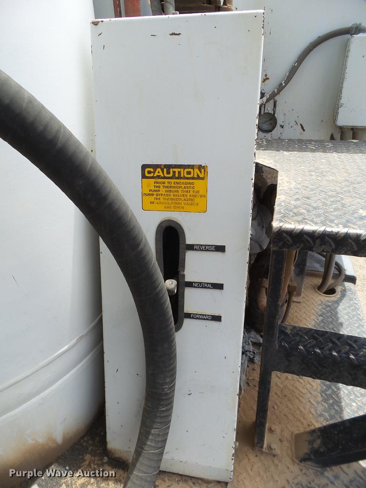 image for item EN9620 1999 GMC T6500 road striper truck