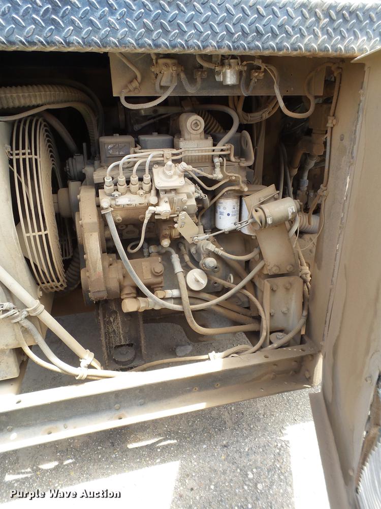 image for item EN9620 1999 GMC T6500 road striper truck