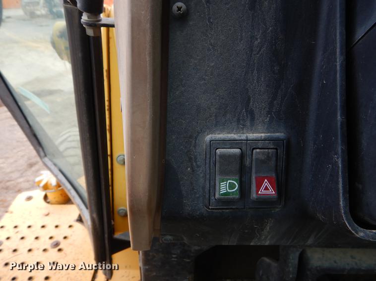 image for item ER9305 1996 John Deere 310D backhoe