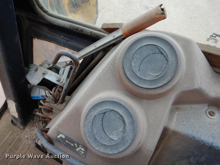 image for item ER9305 1996 John Deere 310D backhoe