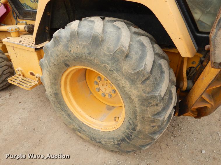 image for item ER9305 1996 John Deere 310D backhoe