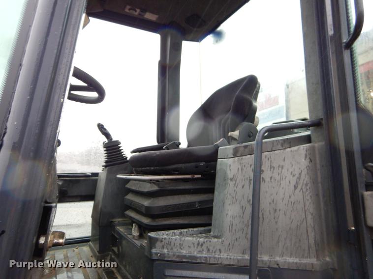 image for item ER9346 2011 John Deere 304J wheel loader