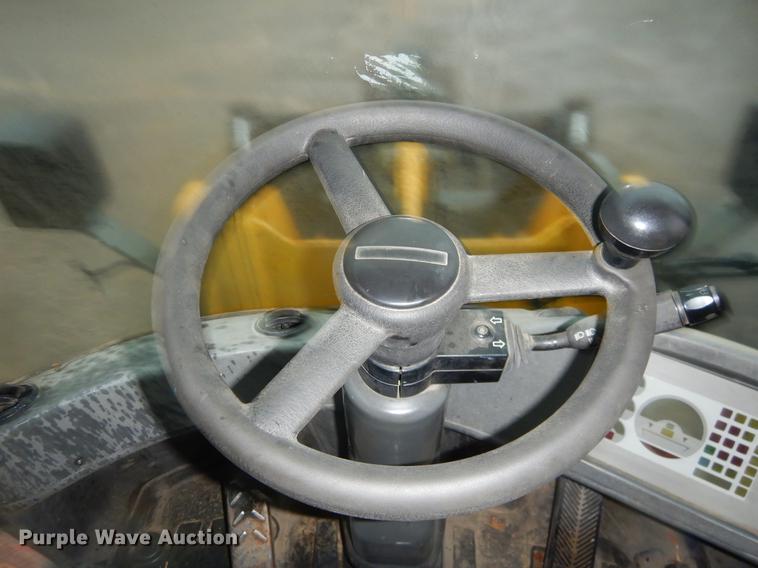 image for item ER9346 2011 John Deere 304J wheel loader