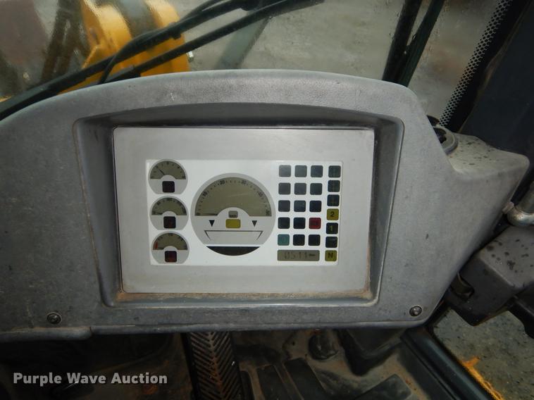 image for item ER9346 2011 John Deere 304J wheel loader