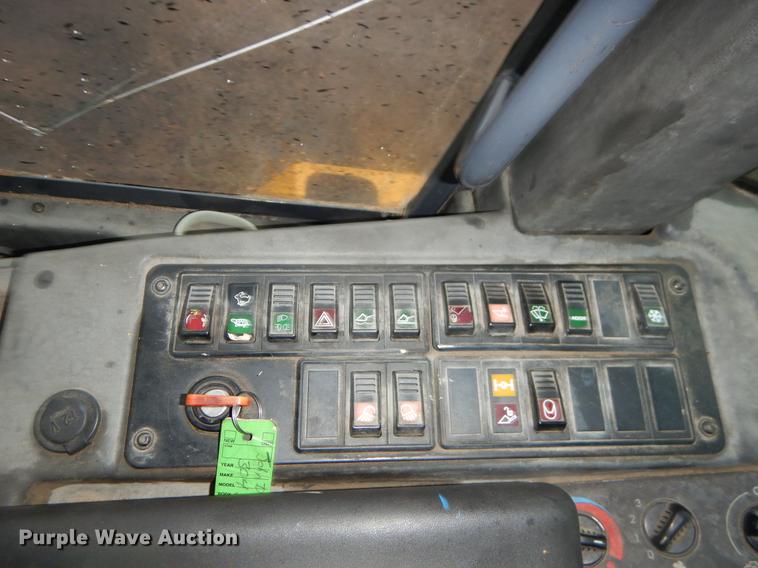 image for item ER9346 2011 John Deere 304J wheel loader