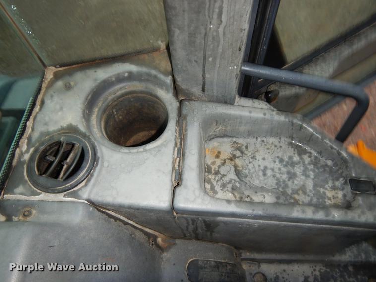 image for item ER9346 2011 John Deere 304J wheel loader