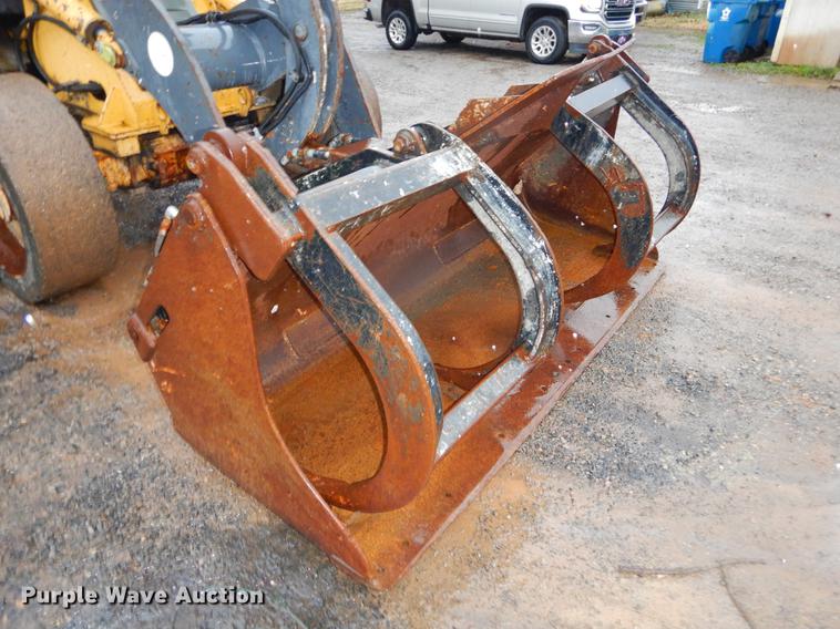 image for item ER9346 2011 John Deere 304J wheel loader