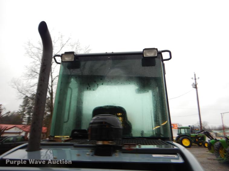 image for item ER9346 2011 John Deere 304J wheel loader