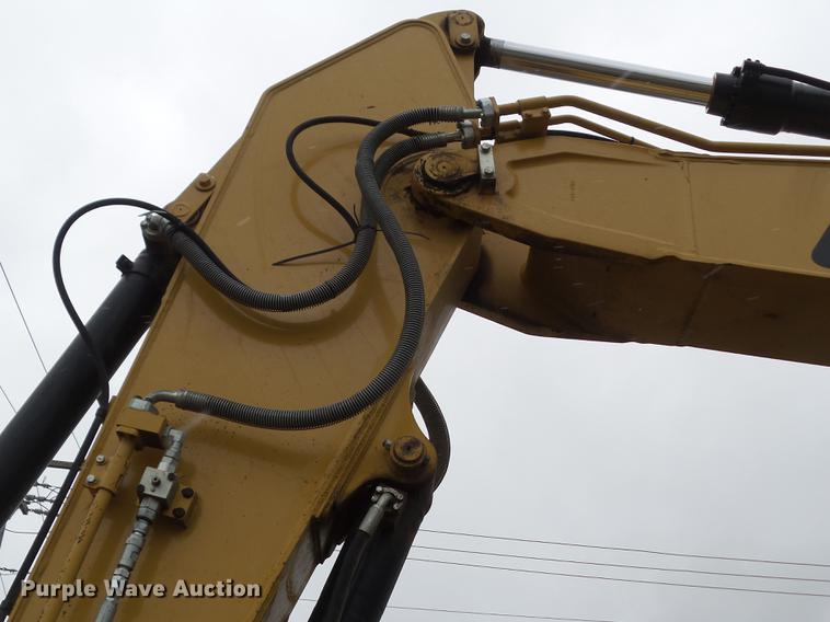 image for item L5728 2013 Caterpillar 320EL excavator