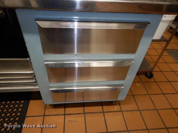 image for item EA9078 Double sided stainless steel work station