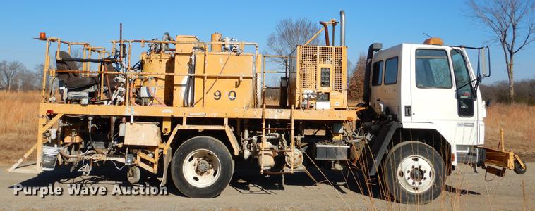 image for item ER9320 1992 Ford CF7000 road striper truck