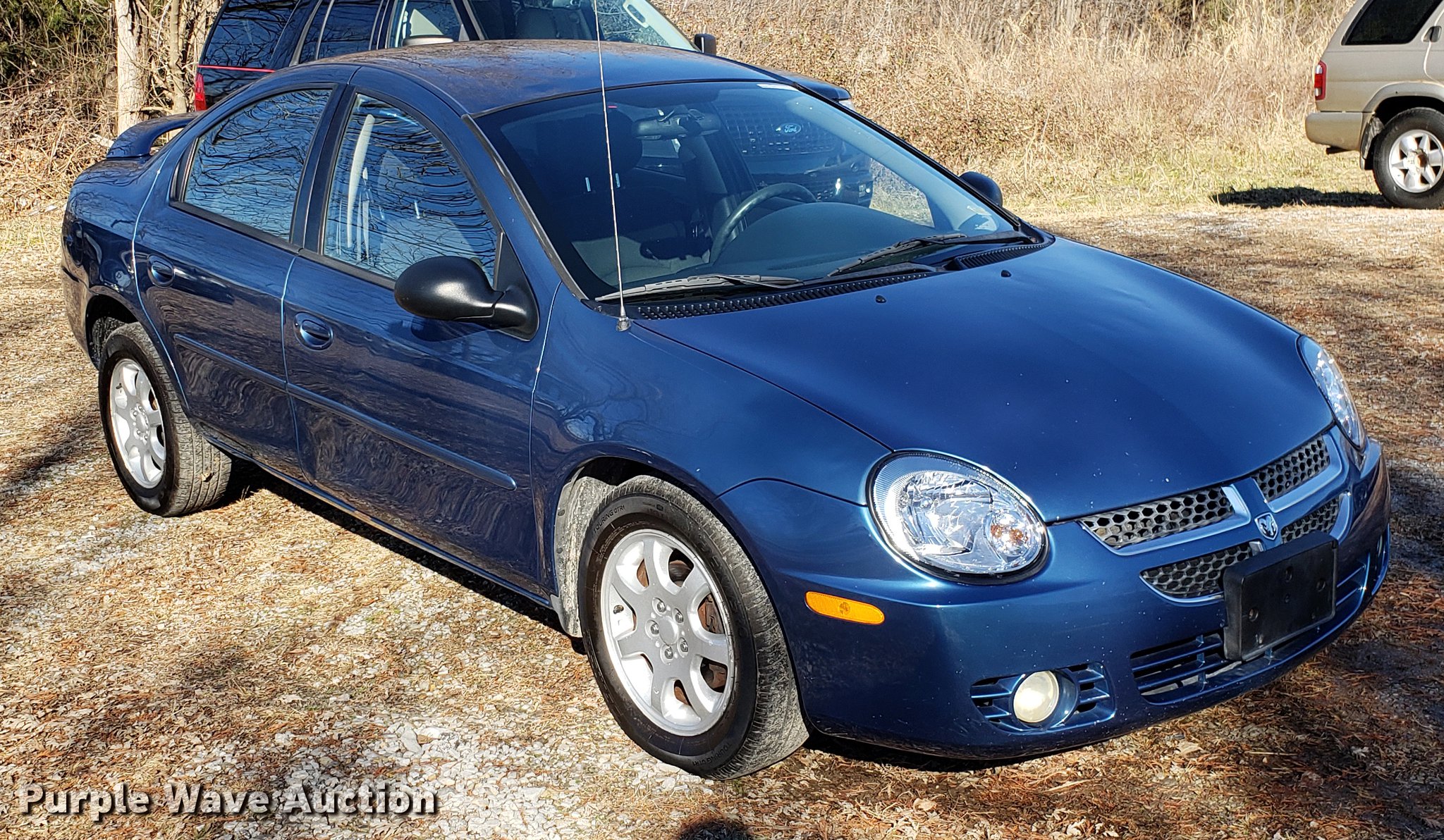 2003 Dodge Neon in Buckner, MO Item AV9386 sold Purple Wave
