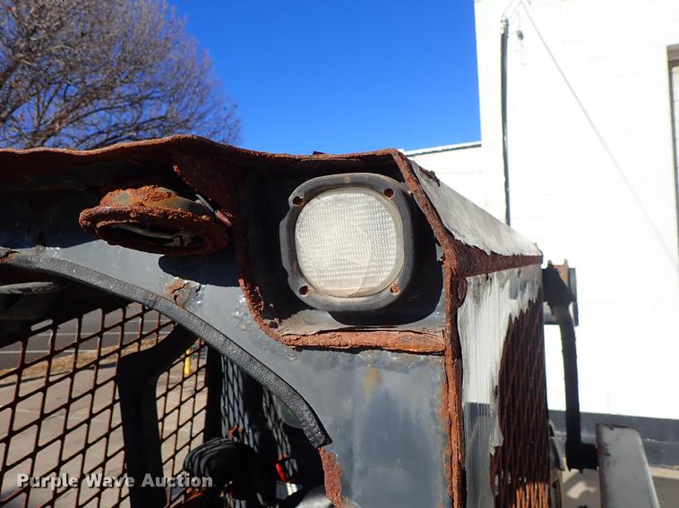 image for item DG2903 2010 John Deere 318D skid steer