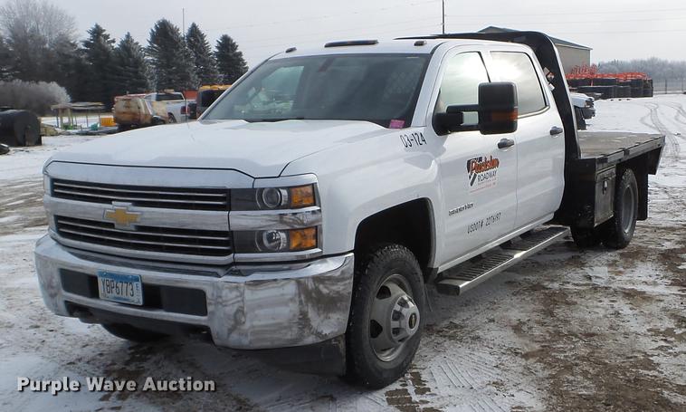 image for item DD0720 2015 Chevrolet Silverado 3500 Crew Cab flatbed pickup truck