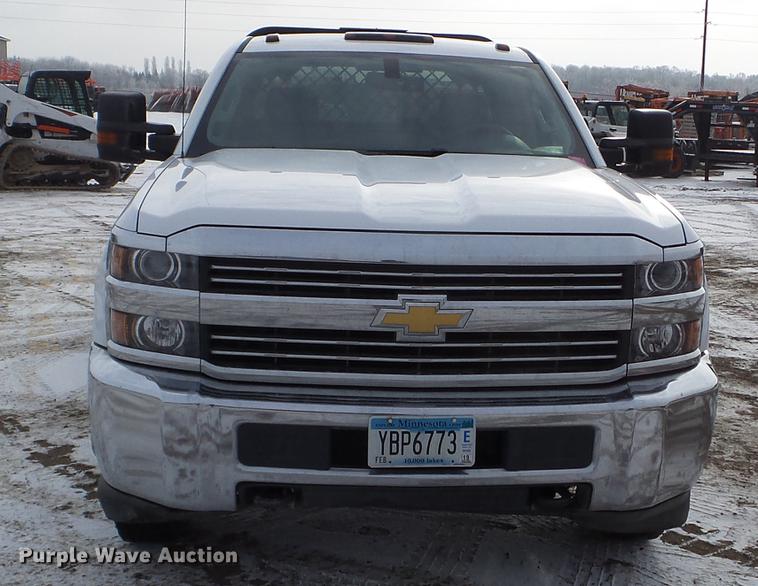 image for item DD0720 2015 Chevrolet Silverado 3500 Crew Cab flatbed pickup truck