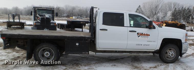 image for item DD0720 2015 Chevrolet Silverado 3500 Crew Cab flatbed pickup truck