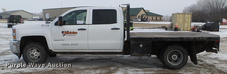 image for item DD0720 2015 Chevrolet Silverado 3500 Crew Cab flatbed pickup truck