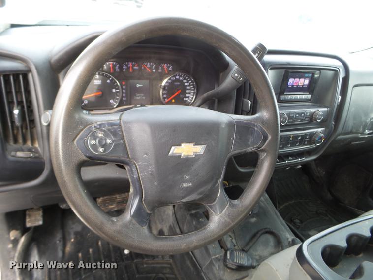 image for item DD0720 2015 Chevrolet Silverado 3500 Crew Cab flatbed pickup truck