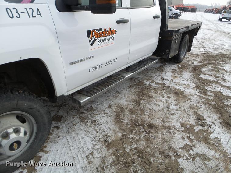 image for item DD0720 2015 Chevrolet Silverado 3500 Crew Cab flatbed pickup truck
