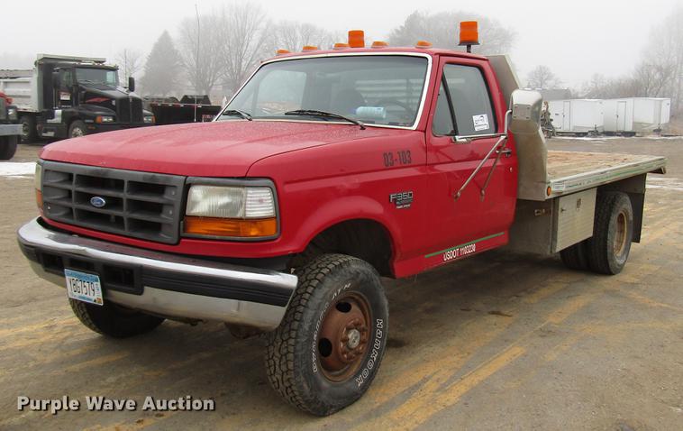 image for item DD0738 1997 Ford F350 flatbed pickup truck