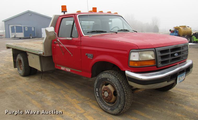 image for item DD0738 1997 Ford F350 flatbed pickup truck