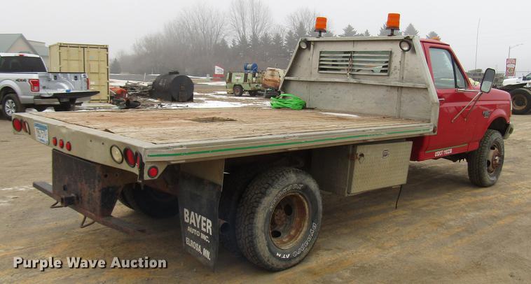 image for item DD0738 1997 Ford F350 flatbed pickup truck