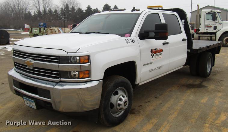 image for item DD0739 2017 Chevrolet Silverado 3500 Crew Cab flatbed pickup truck