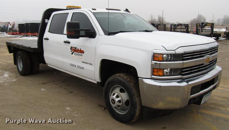 image for item DD0739 2017 Chevrolet Silverado 3500 Crew Cab flatbed pickup truck