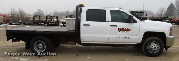 image for item DD0739 2017 Chevrolet Silverado 3500 Crew Cab flatbed pickup truck