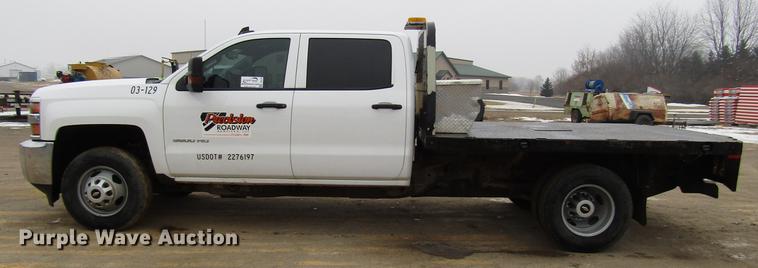 image for item DD0739 2017 Chevrolet Silverado 3500 Crew Cab flatbed pickup truck