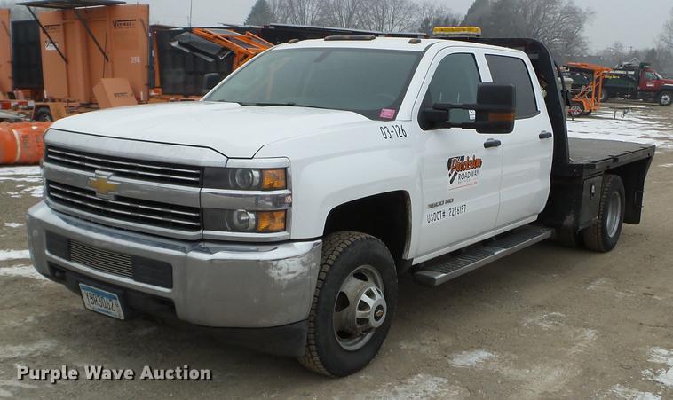 image for item DD0741 2015 Chevrolet Silverado 3500HD Crew Cab flatbed pickup truck