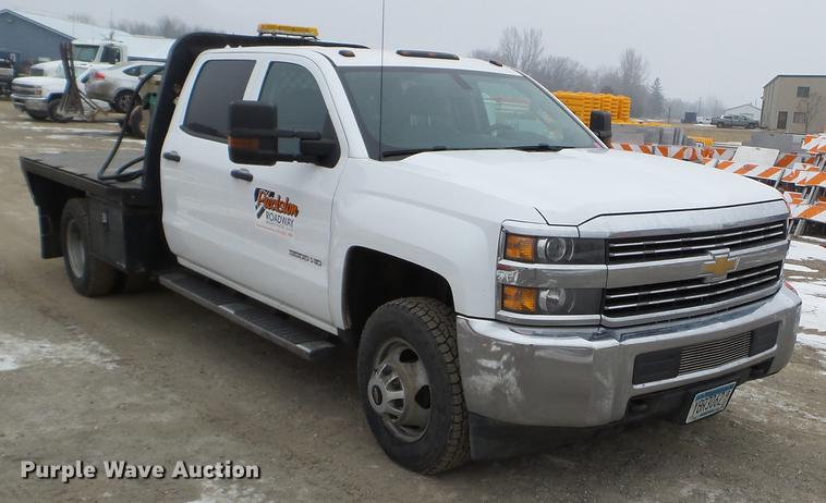 image for item DD0741 2015 Chevrolet Silverado 3500HD Crew Cab flatbed pickup truck