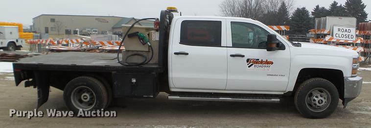 image for item DD0741 2015 Chevrolet Silverado 3500HD Crew Cab flatbed pickup truck