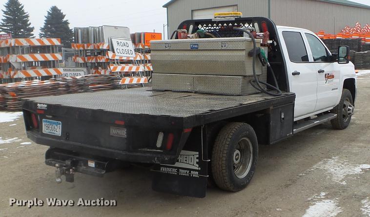 image for item DD0741 2015 Chevrolet Silverado 3500HD Crew Cab flatbed pickup truck